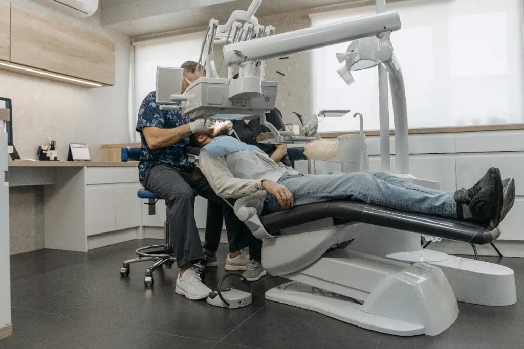 Modern dental clinic with dentist and patient